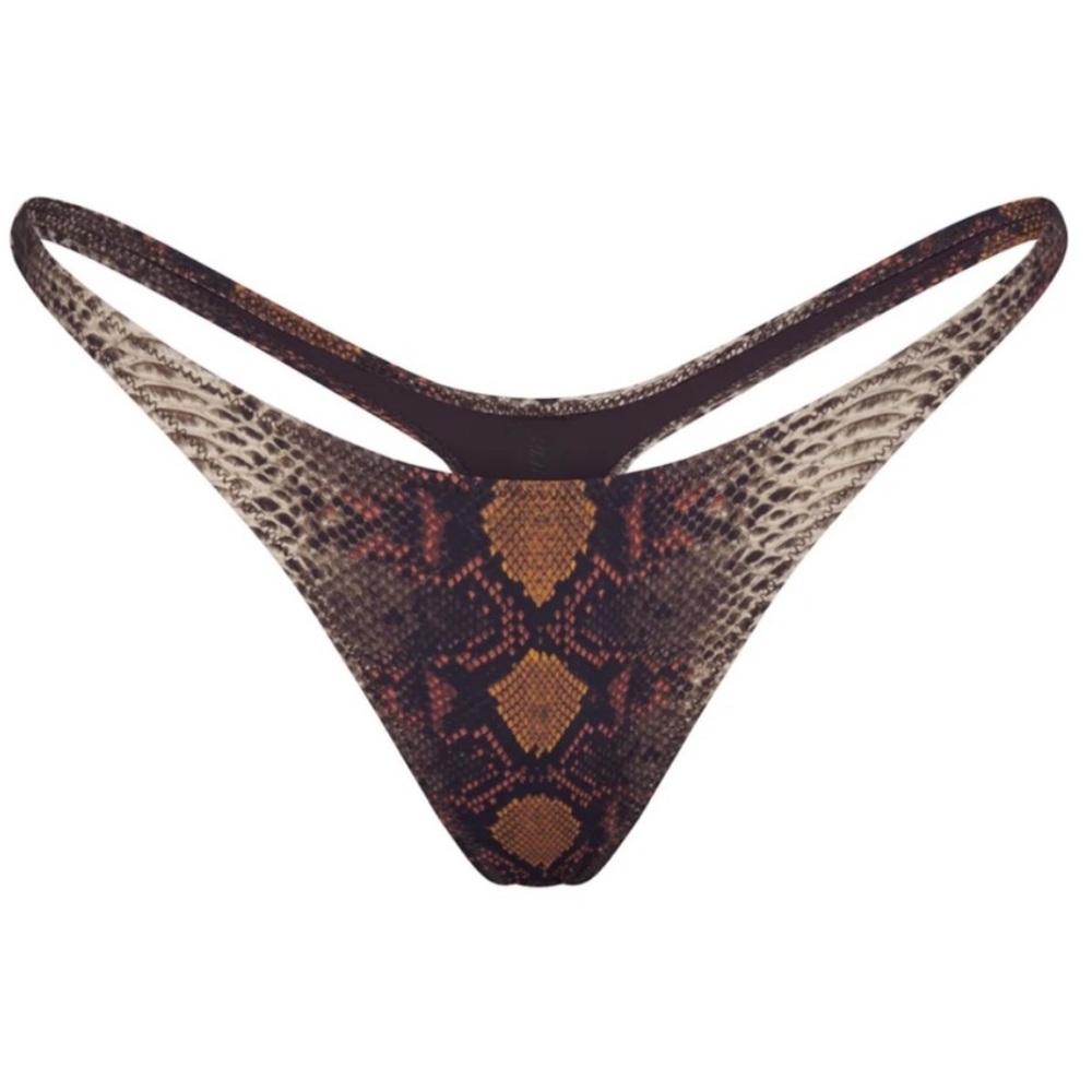 4X Skims Signature swim thong in gorgeous desert snake print. Yummy rich colors
